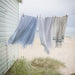 Linens drying by the beach